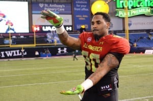 Gerald Willis chomps after the Under Armour All-American Game in January 2014