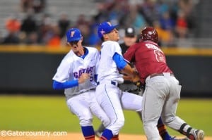 D.J. Stewart collides with LHP Danny Young. 