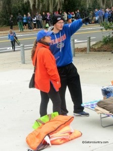 Rowdies Vice President Jonathan Arnholz shows a student where to set up her tent.