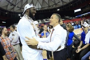 Mar 16, 2014; Atlanta, GA, USA; Florida Gators center Patric Young (4) and head coach Billy Donovan celebrate defeating the Kentucky Wildcats in the championship game for the SEC college basketball tournament at Georgia Dome. Florida won 61-60. Photo: Paul Abell-USA TODAY Sports