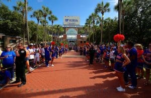 The Florida Gators march into Ben Hill Griffin Stadium greeting the Florida fans before the start of the game versus the Idaho Vandals. Florida Gators vs Idaho Vandals. August 30th, 2014. Gator Country photo by David Bowie.