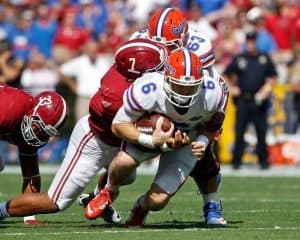 Sep 20, 2014; Tuscaloosa, AL, USA; Florida Gators quarterback Jeff Driskel (6) is tackled by Alabama Crimson Tide linebacker Ryan Anderson (7) at Bryant-Denny Stadium. Mandatory Credit: Marvin Gentry-USA TODAY Sports