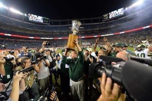 Aug 29, 2014; Denver, CO, USA; Colorado State Rams head coach Jim McElwain holds the Centennial Cup following the win over the Colorado Buffaloes at Sports Authority Field at Mile High. Mandatory Credit: Ron Chenoy-USA TODAY Sports