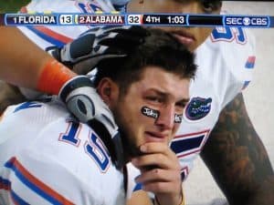 Gators QB Tim Tebow emotional after losing to Alabama in 2009 SEC Championship Game/Courtesy dailysportsstack.com 