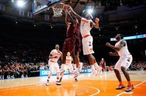 C.J. Fair #5 of the Syracuse Orange and Dorian Finney-Smith #15 of the Virginia Tech Hokies battle for a rebound during the 2011 Dick's Sporting Goods NIT Season Tip-Off (November 22, 2011 - Source: Patrick McDermott/Getty Images North America)