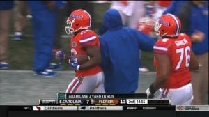 Adam Lane runs off the field after an accident/Screenshot from ESPN