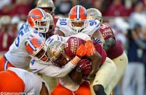 Florida Gators defensive end Alex McCalister makes a tackle against the Florida State Seminoles in 2014- 1280x852- Florida Gators Football