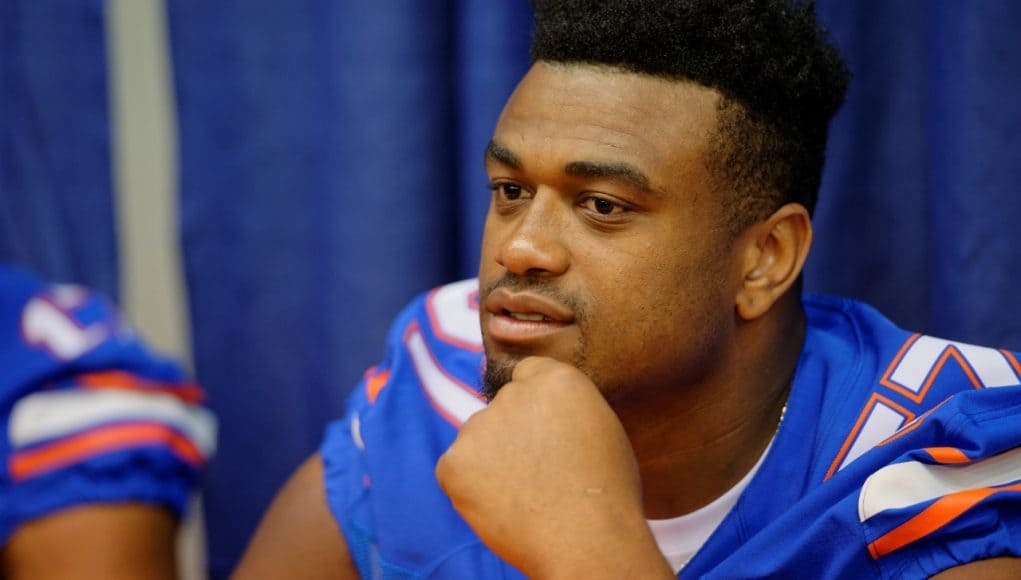 Caleb Brantley waits to sign autographs for fans at the Florida Gators 2015 fan day - Caleb Brantley - Florida Gators - University - of - Florida - Gainesville - Florida