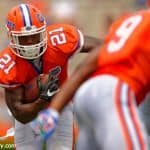 Florida Gators running back Kelvin Taylor carries the ball during the Orange and Blue Debut-Florida-Gators-University-of-Florida