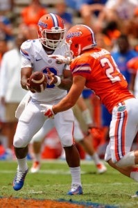 Running Back Case Harrison Takes Handoff From Quarterback Treon Harris During Orange and Blue Debut Florida Gators Football 681x1024