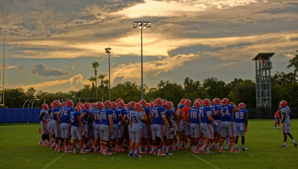 The Florida Gators huddle up before practice on August 27 - Florida Gators football - 1280x852