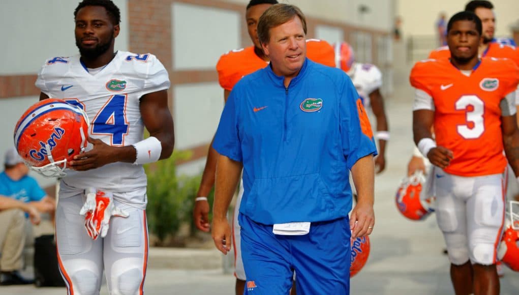 University of Florida head football coach Jim McElwain walks out to fall practice on August 27 - Florida Gators football - 1280x852