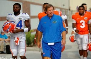 University of Florida head football coach Jim McElwain walks out to fall practice on August 27 - Florida Gators football - 1280x852