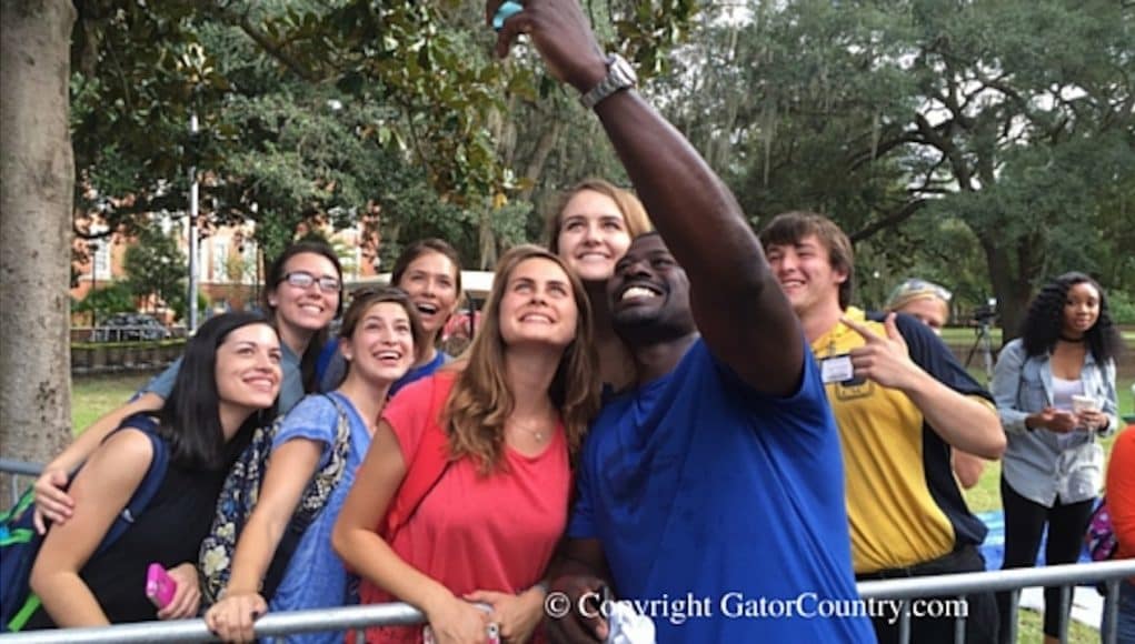 Alex Brown Takes Selfie with Florida Gators Football Fans