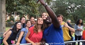 Alex Brown Returns Home to Florida Gators as Mr. Two-Bits Alex Brown Takes Selfie with Florida Gators Football Fans