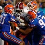 Florida Gators cornerback Jalen Tabor and defensive Justus Reed combine on a tackle against New Mexico State in 2015- 1280x853