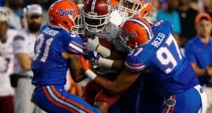 Florida Gators cornerback Jalen Tabor and defensive Justus Reed combine on a tackle against New Mexico State in 2015- 1280x853