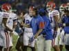 Florida Gators head coach Jim McElwain meets with his team during the Gators win over Kentucky- 1280x853