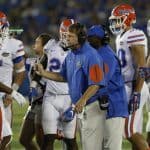 Florida Gators head coach Jim McElwain meets with his team during the Gators win over Kentucky- 1280x853