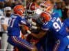 Sophomores Jalen Tabor and Quincy Wilson join redshirt freshman Justus Reed on a tackle in Florida's 61-13 win over New Mexico State- Florida Gators Football- 1280x852