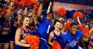 Juniors Vernon Hargreaves III and Demarcus Robinson celebrate with cheerleaders following the Florida Gators 28-27 win over the Tennessee Volunteers- Florida Gators football- 1280x854
