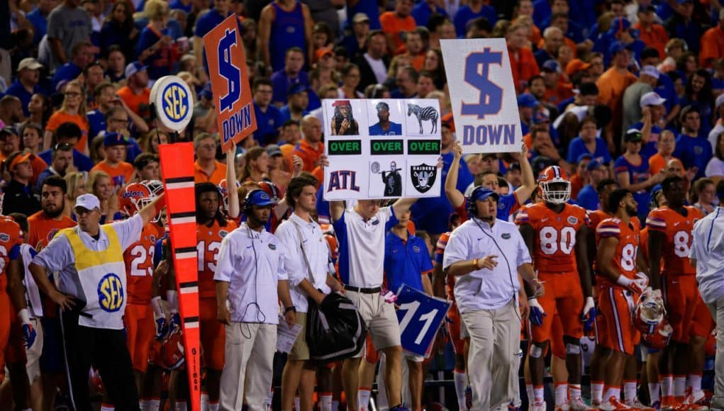 University of Florida defensive coordinator Geoff Collins signals in plays during the Florida Gators win over ECU- Florida Gators football- 1280x854