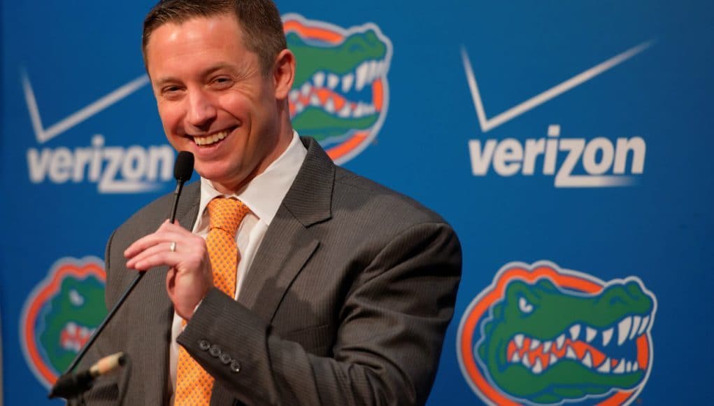 University of Florida head basketball coach Mike White at the podium for his first Florida Gators basketball media day appearence- Florida Gators basketball- 1280x852