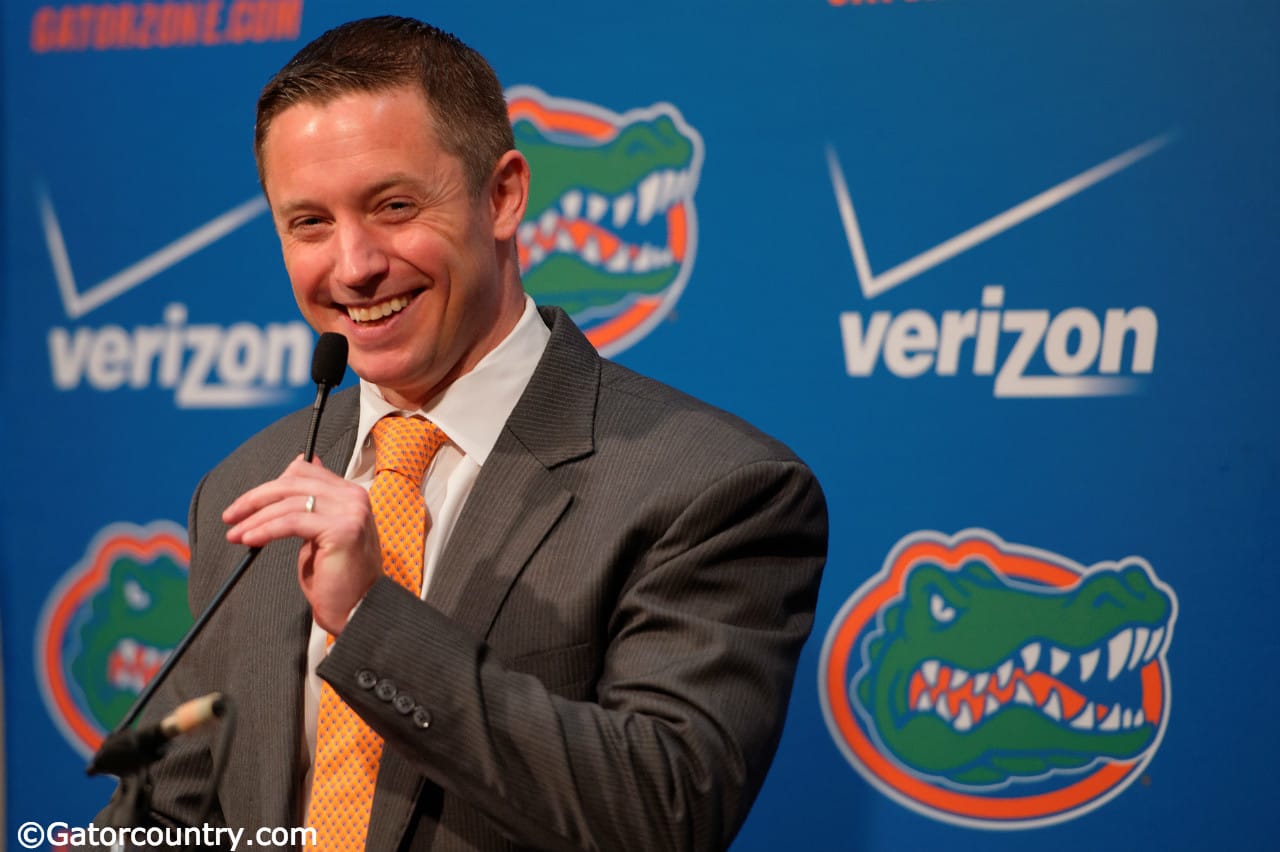 University of Florida head basketball coach Mike White at the podium for his first Florida Gators basketball media day appearence- Florida Gators basketball- 1280x852