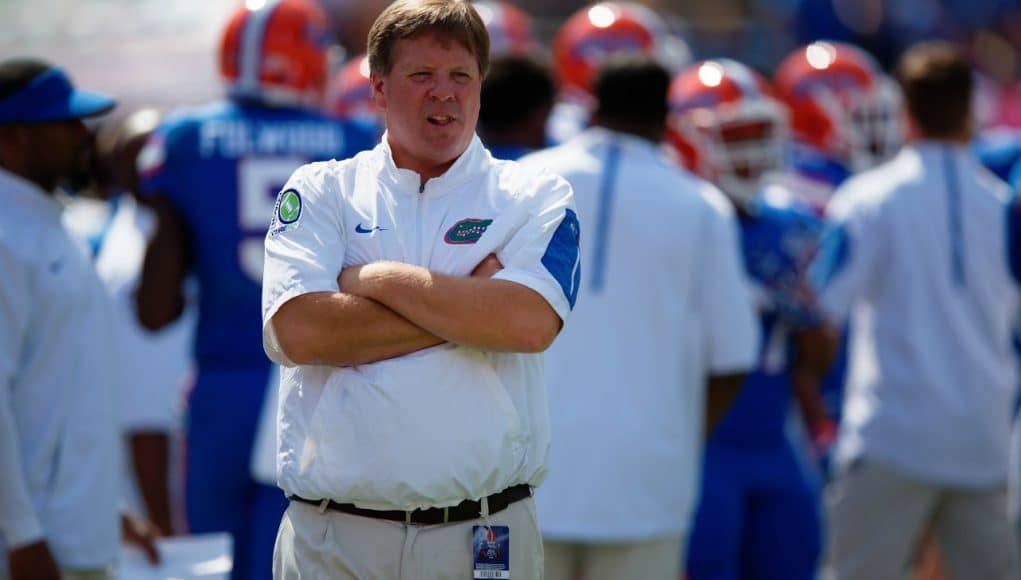 University of Florida head coach Jim McElwain observes his football team warming up before their game agianst Tennesse- Florida Gators football- 1280x852