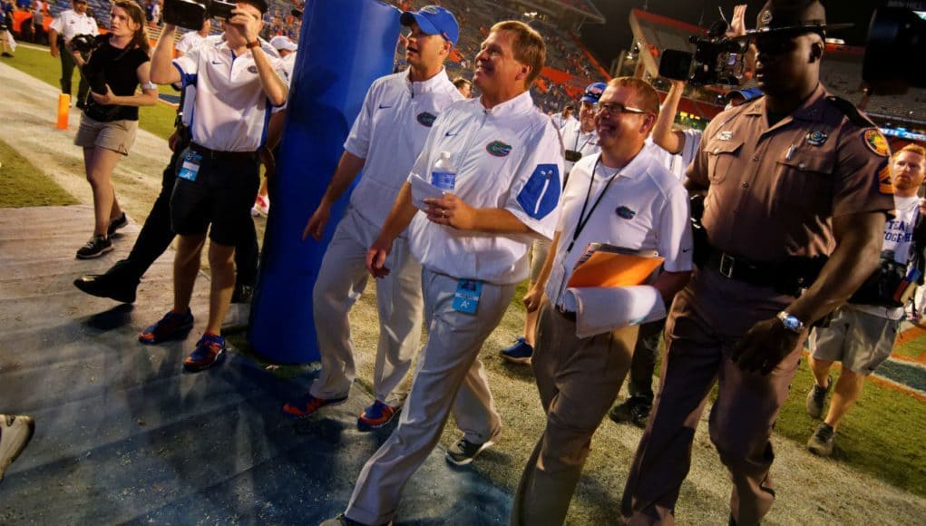 University of Florida head football coach Jim McElwain walks off of the field following his first win at Florida- Florida Gators football- 1280x852