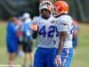 University of Florida junior safety Keanu Neal helps a teammate during fall camp- Florida Gators football- 1280x852