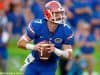 University of Florida quarterback Will Grier scrambles and looks for a receiver down field- Florida Gators football- 1280x852