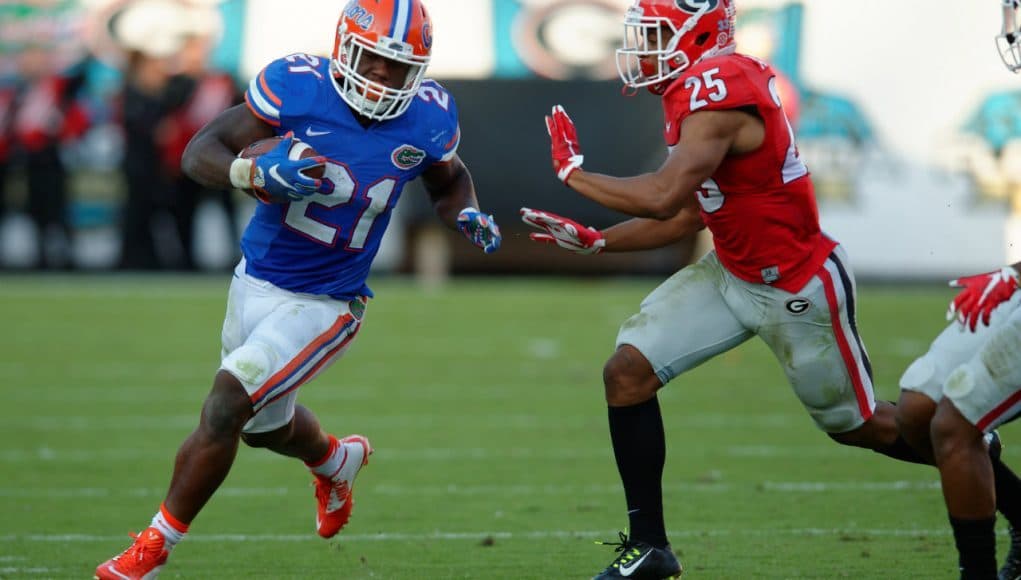 Florida Gators running back Kelvin Taylor runs for a first down against Georgia in 2015- 1280x852