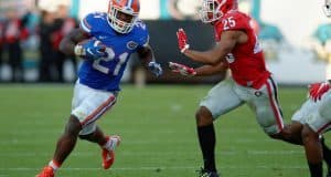 Florida Gators running back Kelvin Taylor runs for a first down against Georgia in 2015- 1280x852