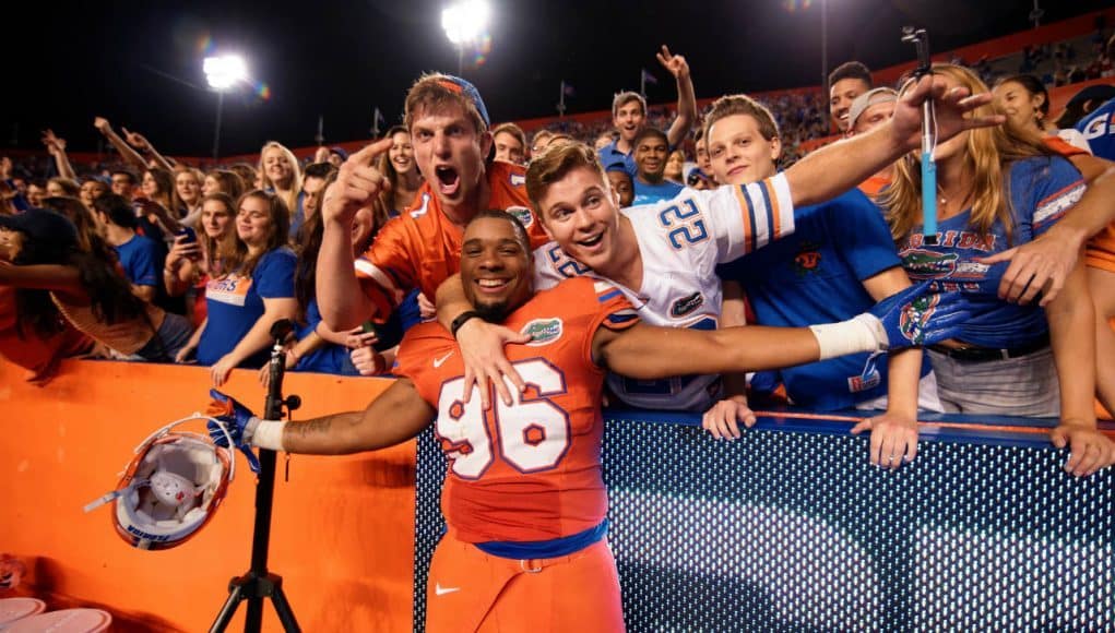 University of Florida freshman defensive lineman CeCe Jefferson celebrates with fans following the Florida Gators 38-10 win over Ole Miss- Florida Gators football- 1280x852