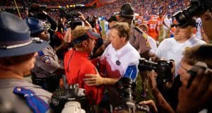 University of Florida head coach Jim McElwian greets Ole Miss head coach Hugh Freeze after Florida's 38-10 win over the Rebels- Florida Gators football- 1280x854