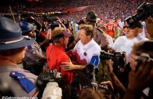 University of Florida head coach Jim McElwian greets Ole Miss head coach Hugh Freeze after Florida's 38-10 win over the Rebels- Florida Gators football- 1280x854