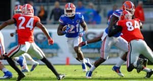 Mapping Florida Gators path to SEC Championship University of Florida running back Kelvin Taylor carries the ball against the Georgia Bulldogs in 2014- Florida Gators football- 1280x852