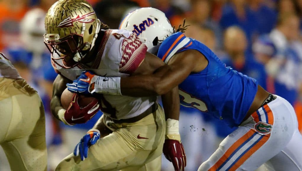 Daniel McMillian tackles Dalvin Cook in 2015- Florida Gators- 1280x851