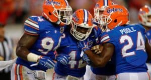Florida Gators defensive players celebrate Keanu Neal's interception- 1280x852