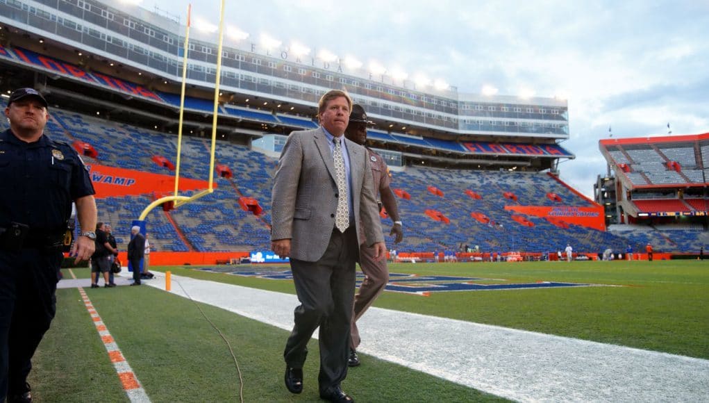 Jim McElwain takes his pre-game walk around the field at Ben Hill Griffin Stadium- Florida Gators football- 1280x852