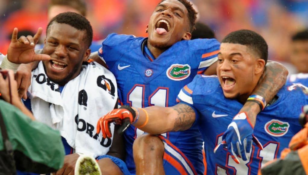 Kelvin Taylor, Demarcus Robinson and Jalen Tabor celebrate the Florida Gators overtime win over FAU- Florida Gators football- 1280x852