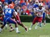 South Carolina running back Brandon Wilds runs against the Florida Gators in 2014- Florida Gators football- 1280x852