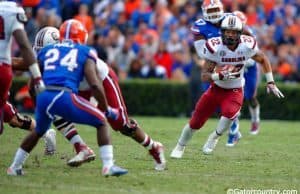 South Carolina running back Brandon Wilds runs against the Florida Gators in 2014- Florida Gators football- 1280x852