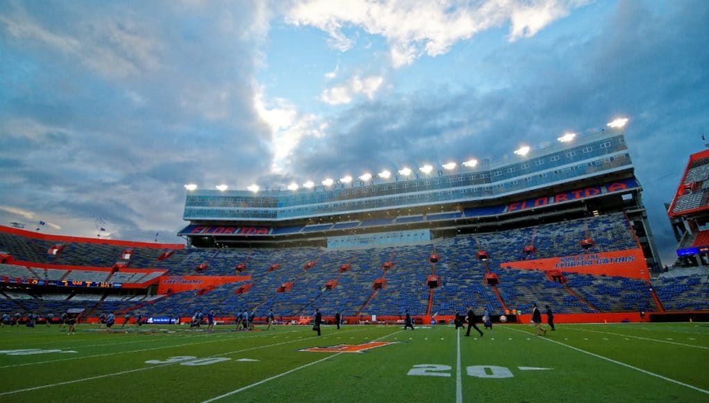 The Florida Gators walk across the filed during Gator Walk before taking on the Florida State Seminoles- Florida Gators football- 1280x852