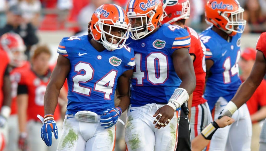 University of Florida football players Brian Poole and Jarrad Davis celebrate during the Florida Gators win over the Georgia Bulldogs- Florida Gators football- 1280x852