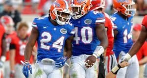 University of Florida football players Brian Poole and Jarrad Davis celebrate during the Florida Gators win over the Georgia Bulldogs- Florida Gators football- 1280x852