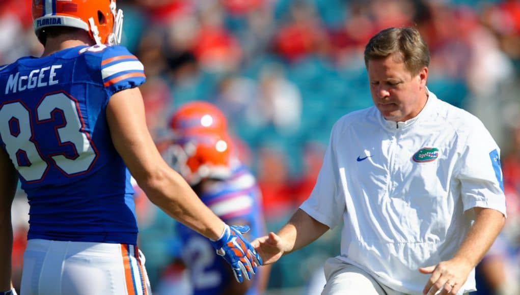 University of Florida head football coach Jim McElwain greets senior tight end Jake McGee before the Florida Gators game against Georgia- Florida Gators football- 1280x852