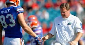 University of Florida head football coach Jim McElwain greets senior tight end Jake McGee before the Florida Gators game against Georgia- Florida Gators football- 1280x852