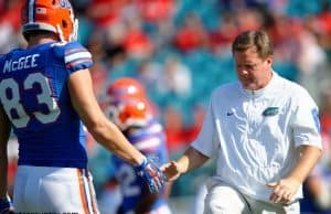 University of Florida head football coach Jim McElwain greets senior tight end Jake McGee before the Florida Gators game against Georgia- Florida Gators football- 1280x852